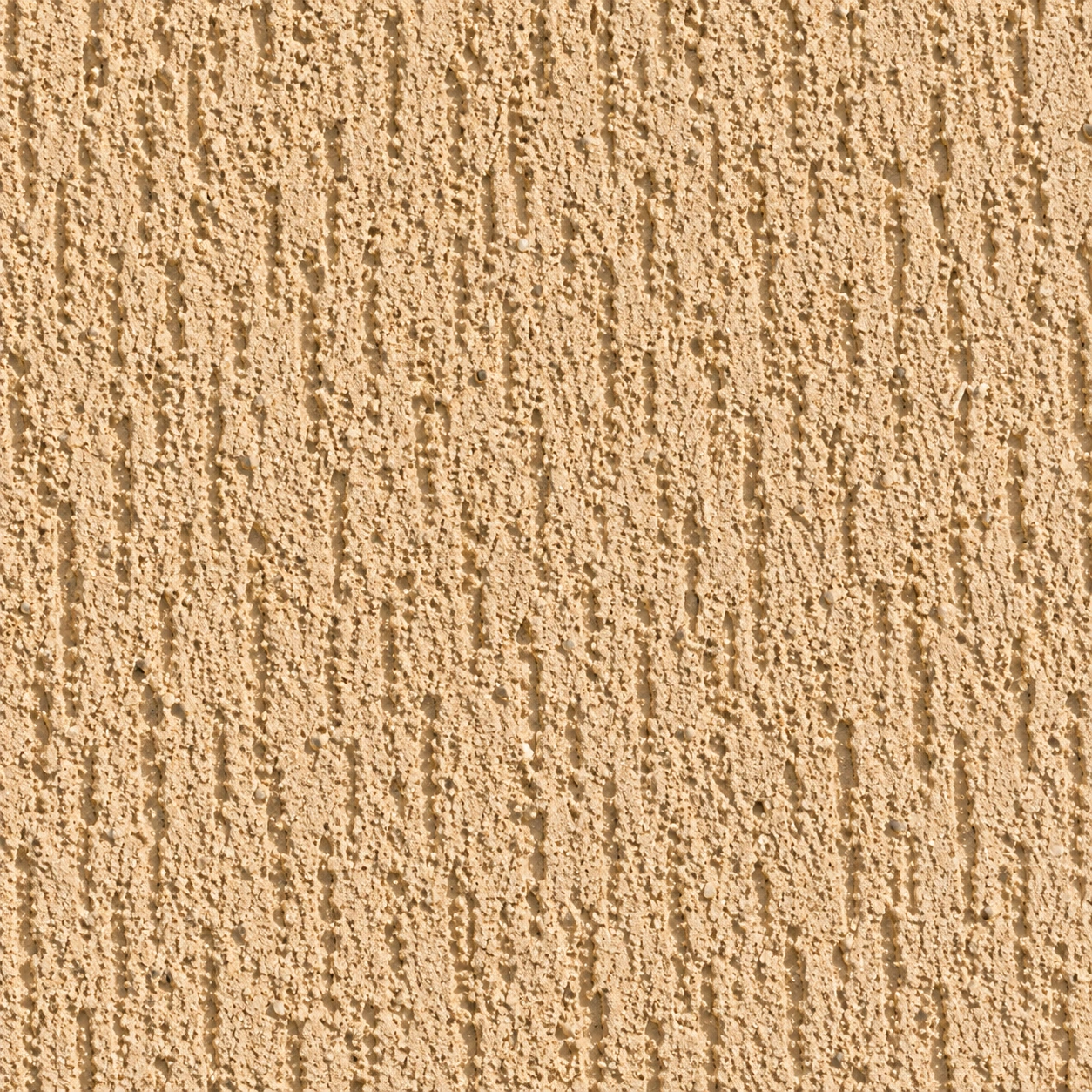 Gros plan GRAFFIORA : stries verticales griffées dans une matière couleur sable